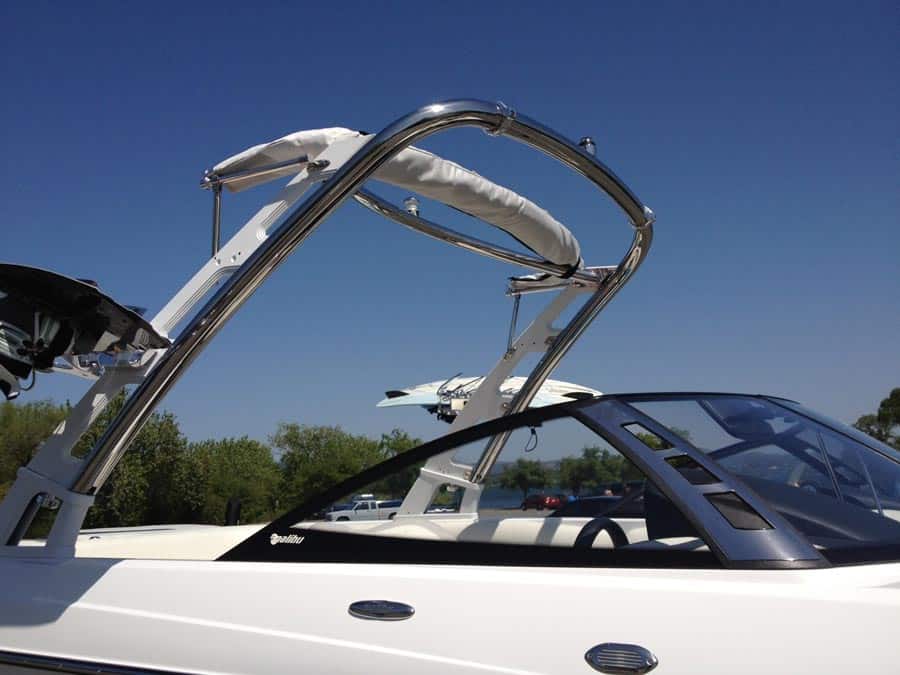 Malibu G3 Complete Bimini top installed over boat tower, providing shade and protection from the sun.