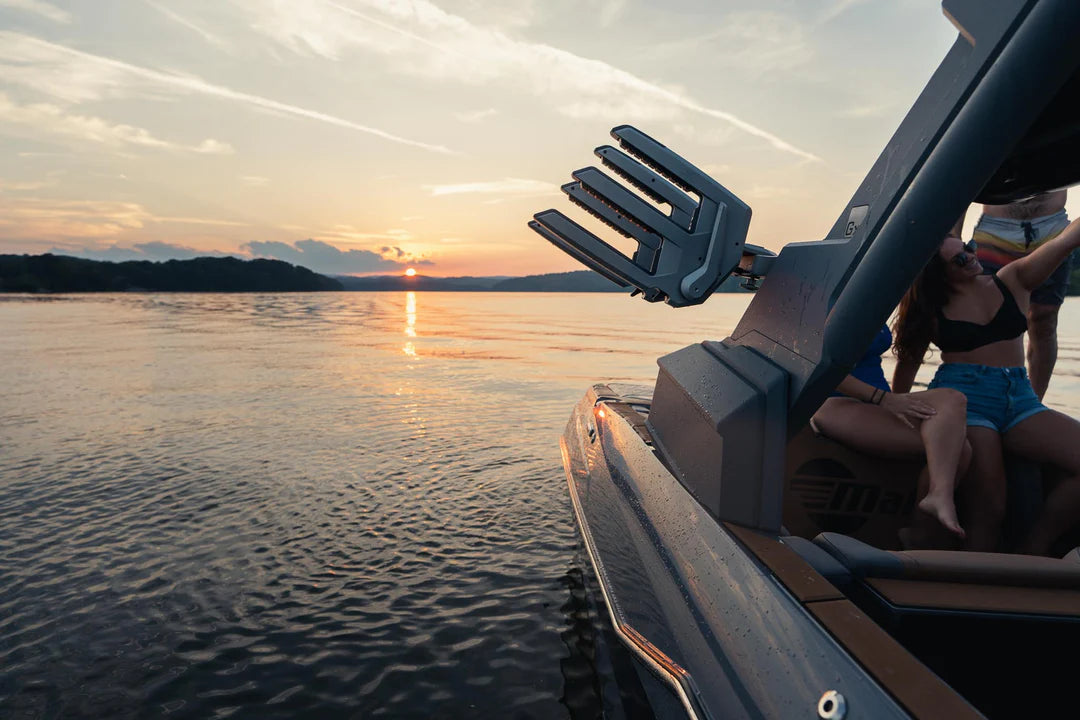 AXIS Gen 3 Clamping Racks mounted on a boat during sunset, designed for secure equipment organization on marine vessels.