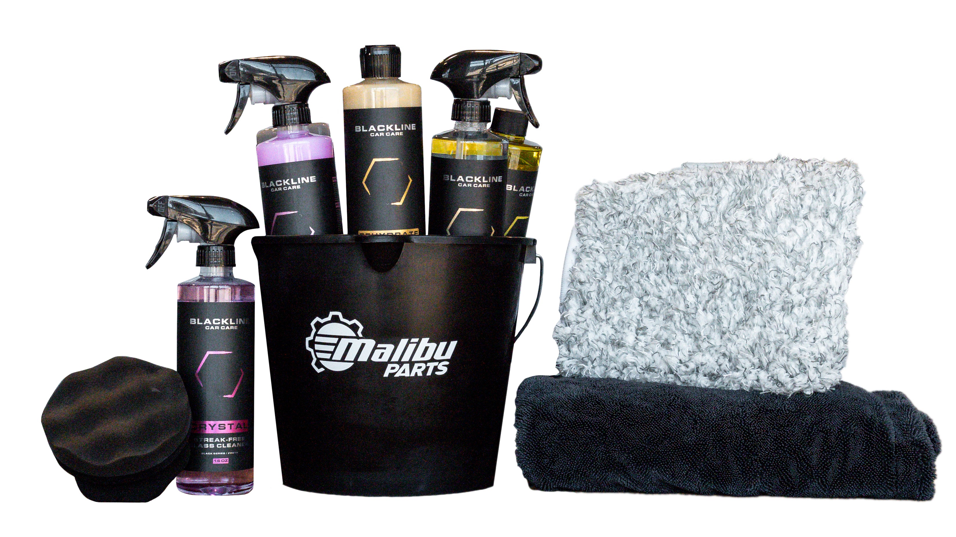 Blackline Detail Bundle Kit with spray bottles, cleaning cloths, and a black bucket for car detailing.