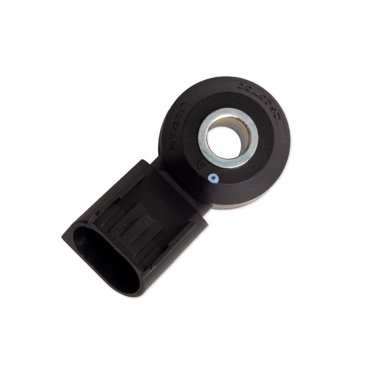 GM Knock Sensor Kit, black round sensor with electrical connector, used to detect engine knocking in GM vehicles.