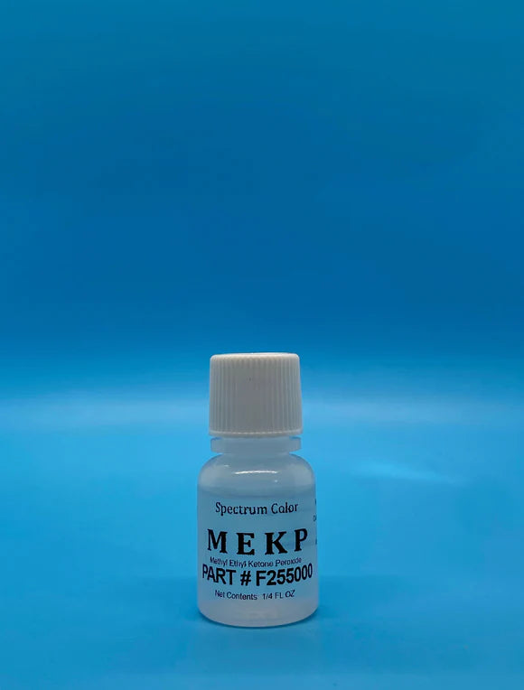 Small white bottle of Gel Coat Catalyst Hardener (MEKP) with a white cap, labeled with part number and chemical details, against a blue background.
