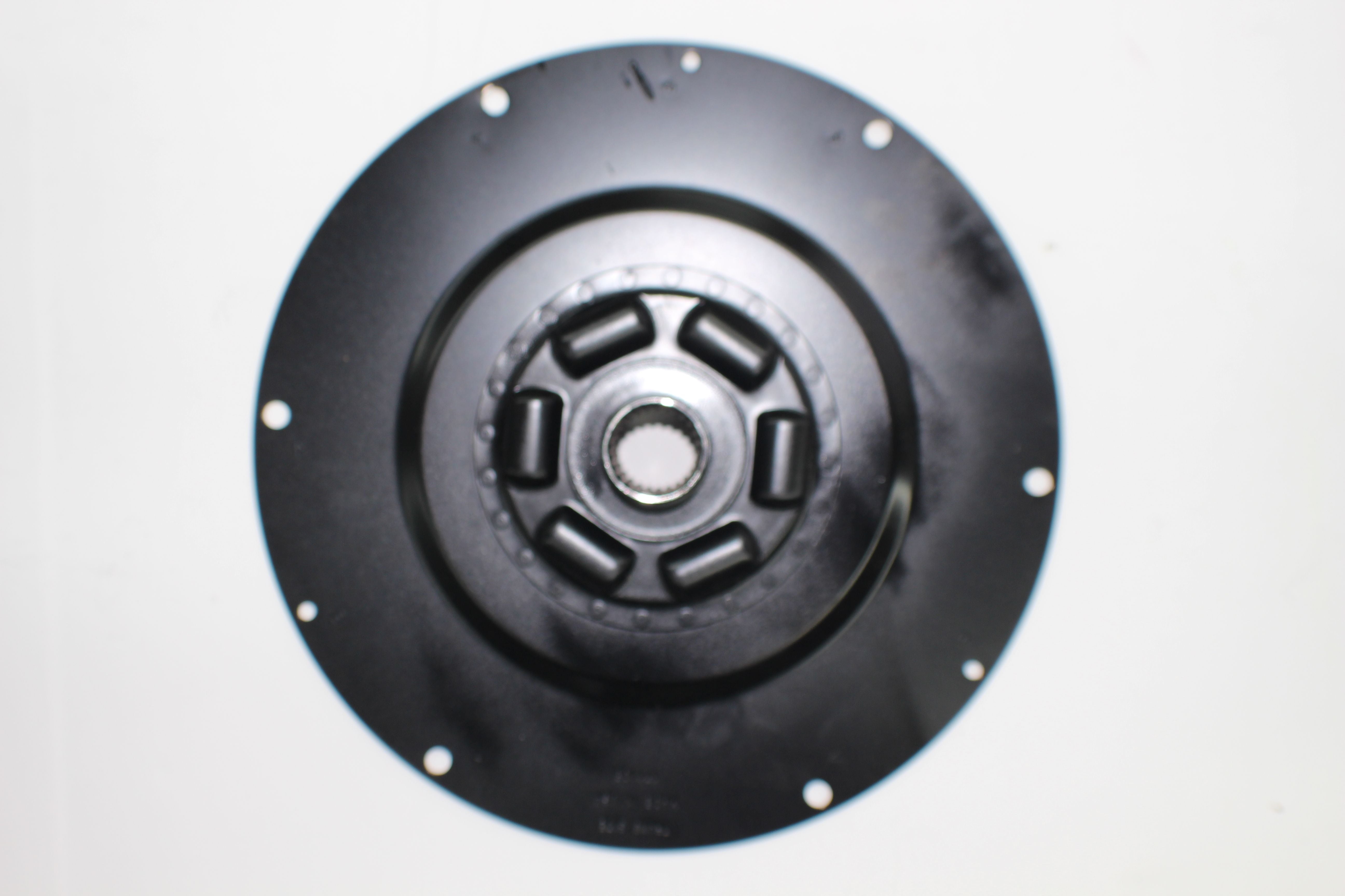Ford 6.2 Raptor drive plate, black metal automotive part with central splined hub and mounting holes.