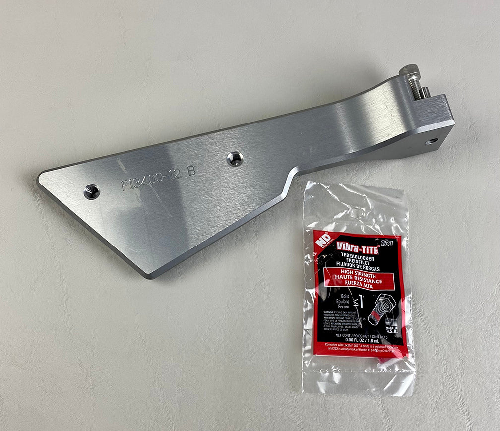 Aluminum PTM Gen 2 & 3 Clamping Rack Mounting Arm with mounting holes, next to a bag of Vibra-TITE threadlocker.