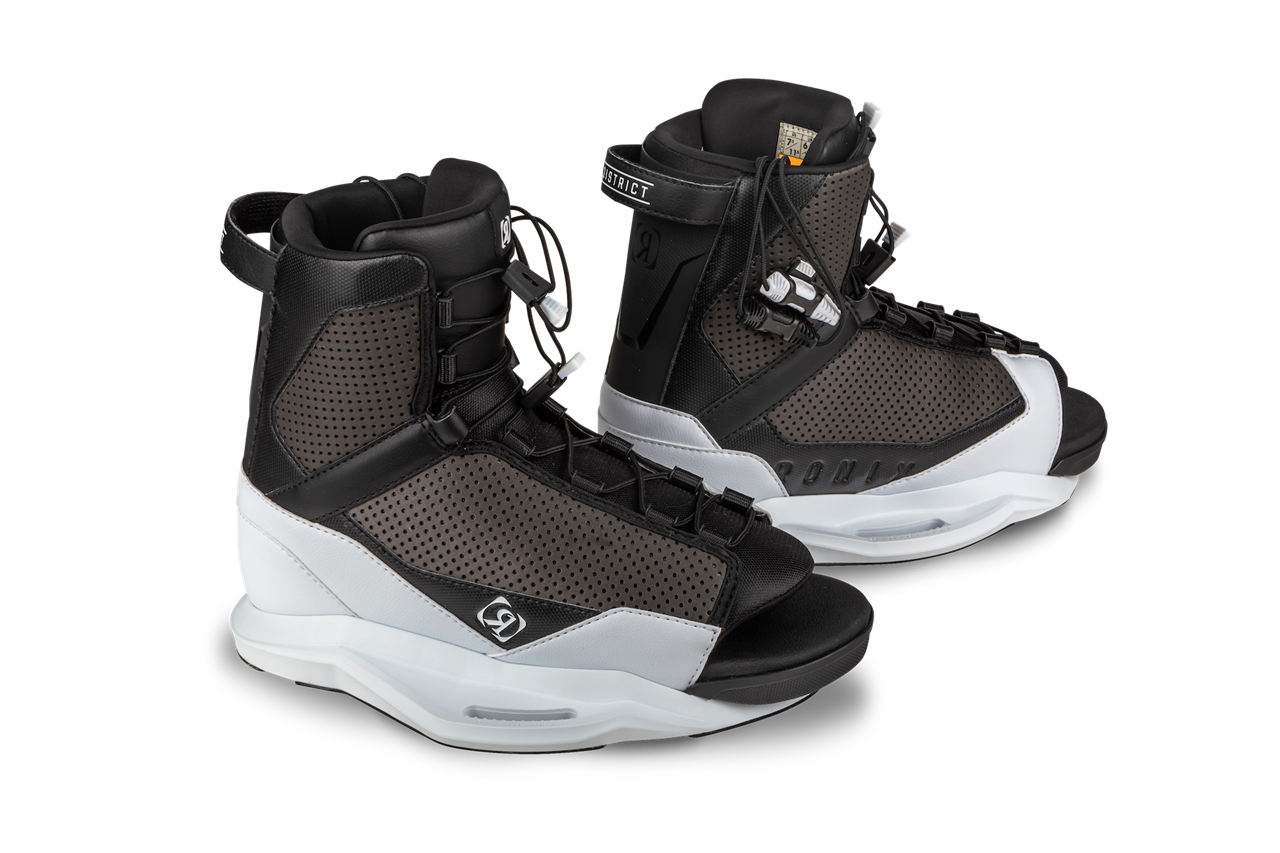 Black and white Ronix District Stage 2 snowboard bindings with padded ankle straps and adjustable laces.