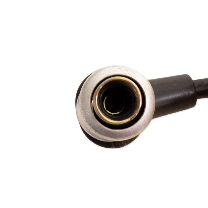 Close-up of an Indmar spark plug wire 6.0 LY6/L96 with tube-in-tube design, showing the connector end on a white background.