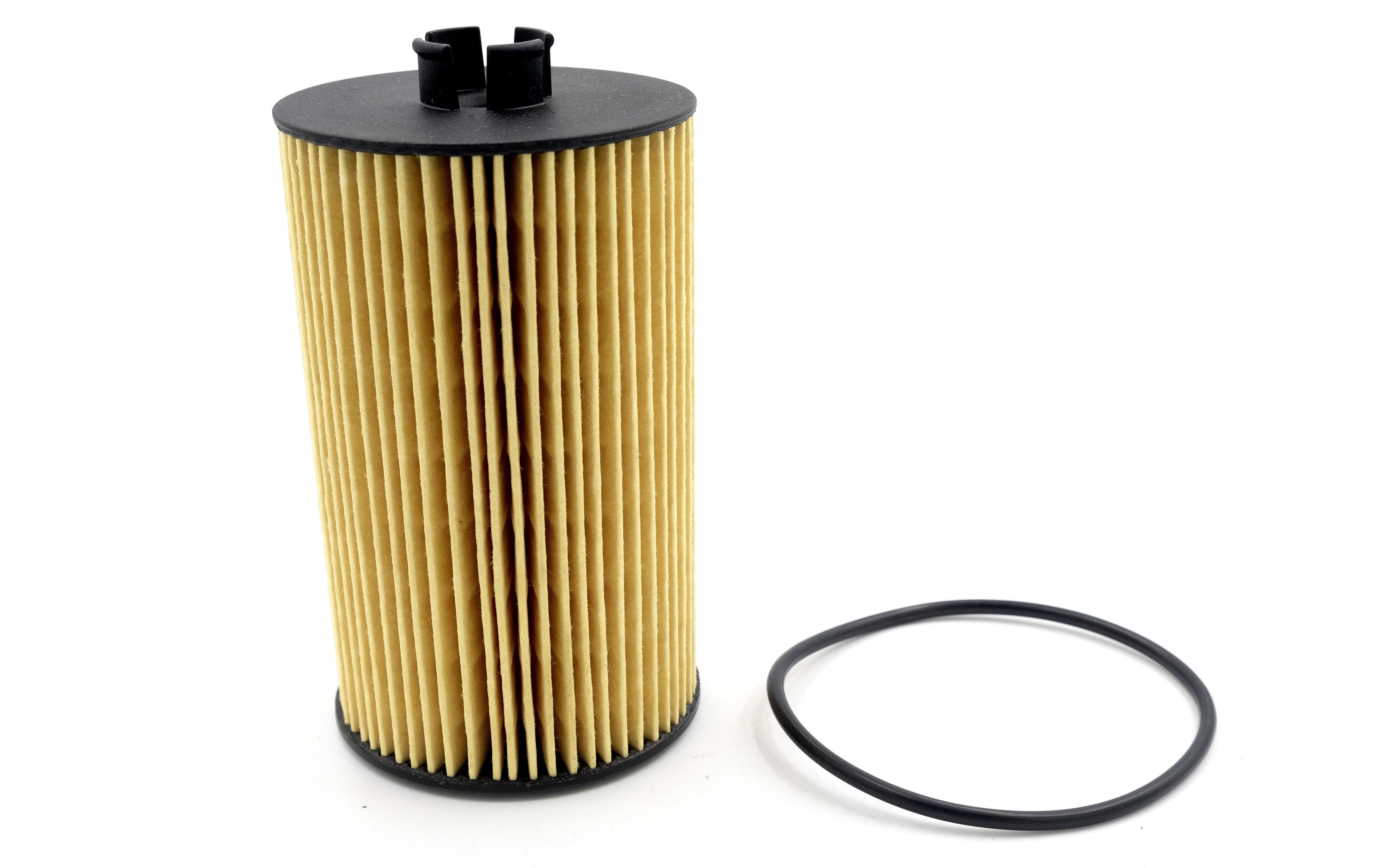 Oil filter cartridge M-Series/LT4 first-gen with black end caps and a matching rubber O-ring for sealing.