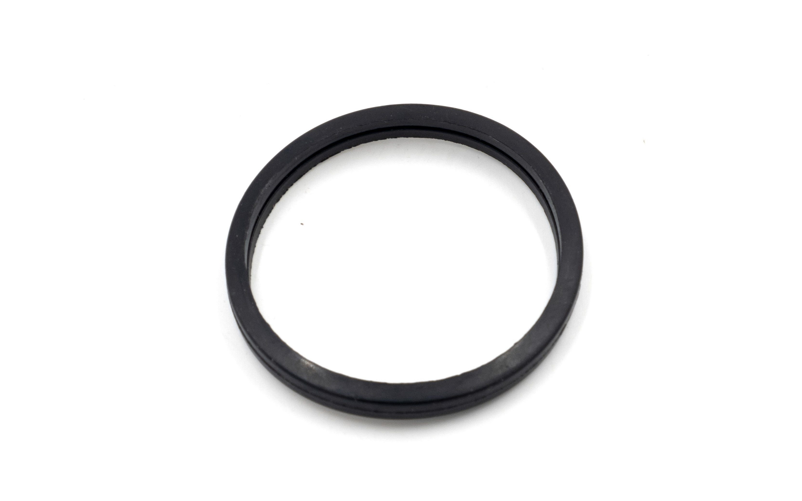 Black exhaust elbow gasket for M-Series/LT4 thermostats, designed to seal the connection and prevent leaks.