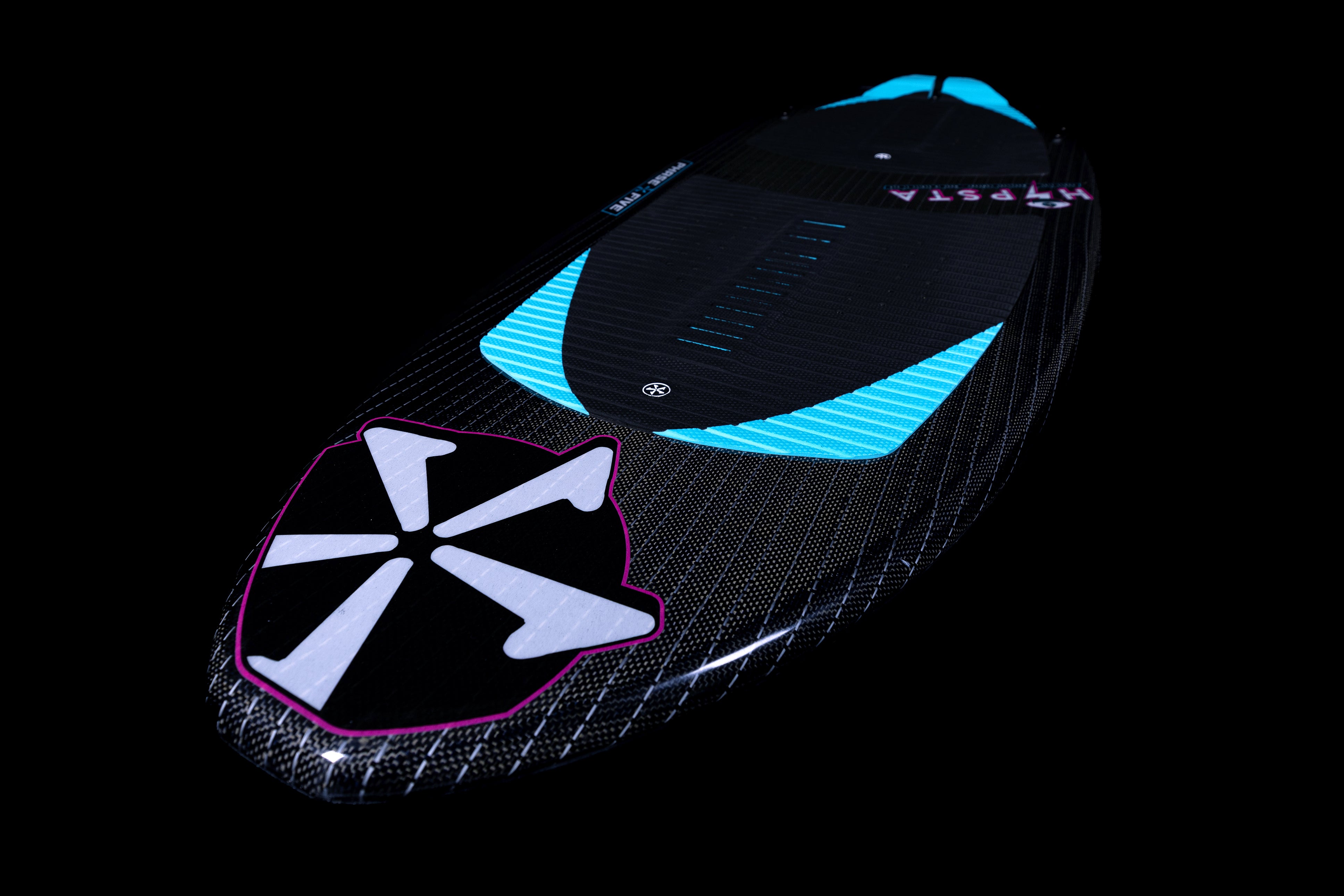 2025 Phase 5 Hypsta skim board featuring a sleek black design with blue accents and a distinctive graphic on the bottom.