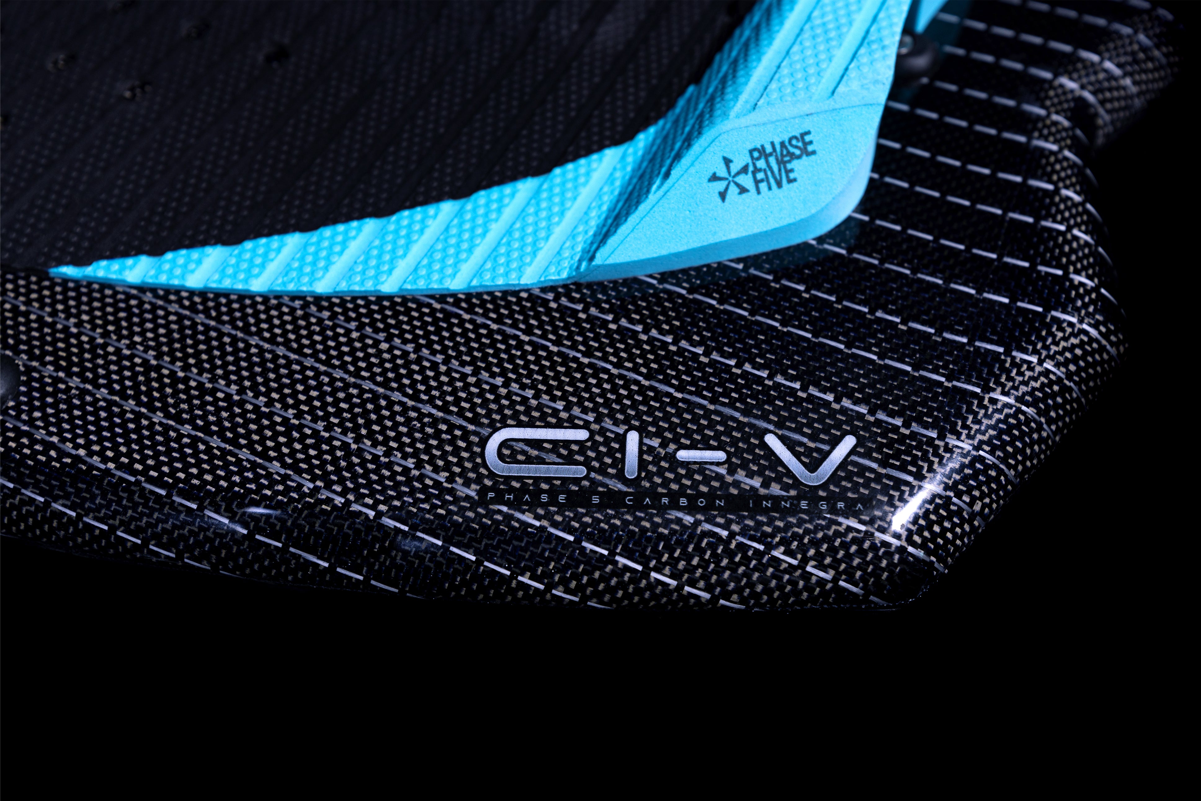 Close-up of the 2025 Phase 5 Hypsta skim board showcasing its textured surface and sleek design with branding details.