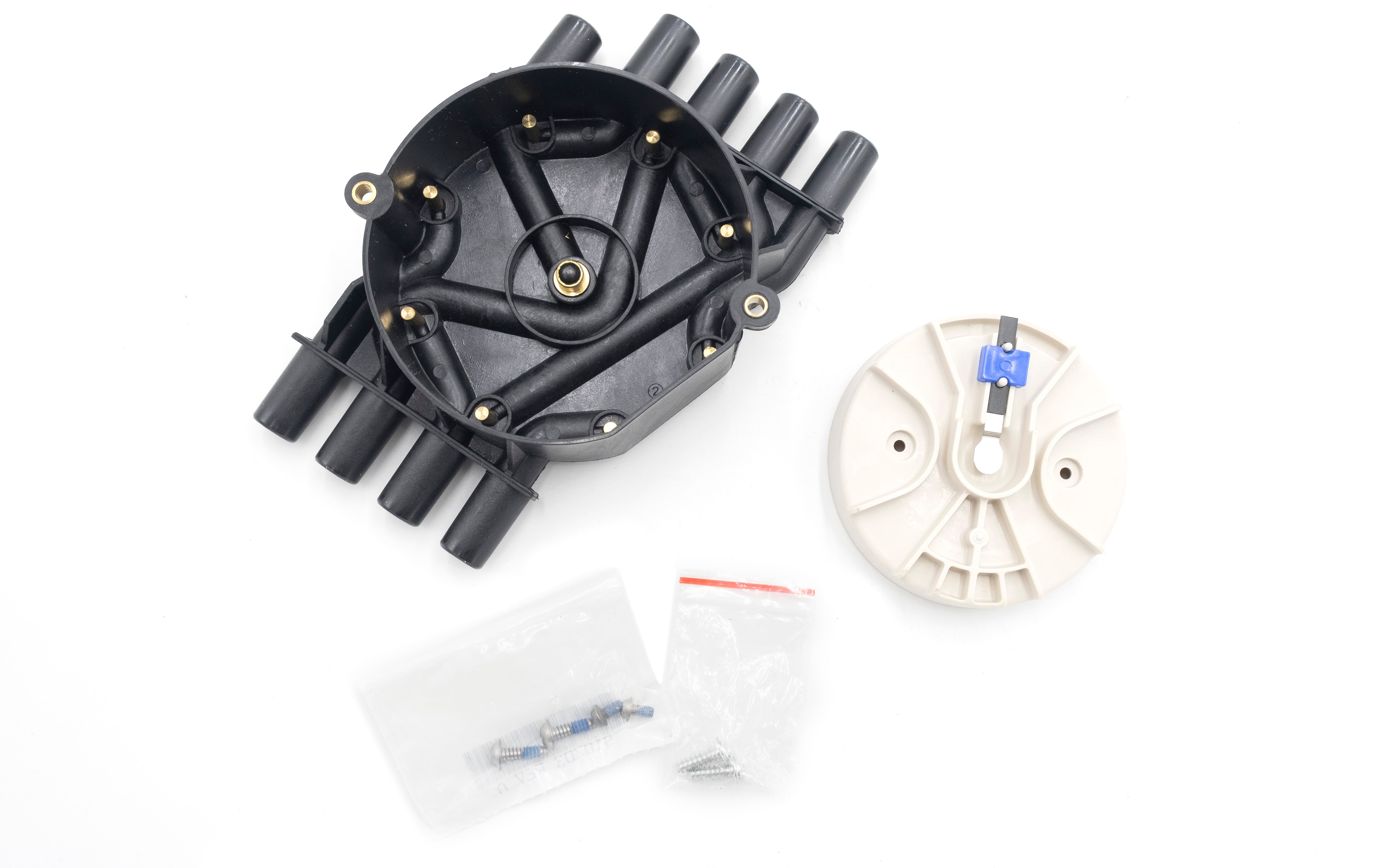 PCM Crusader distributor cap and rotor kit (HVS) with screws and mounting components on a white background.