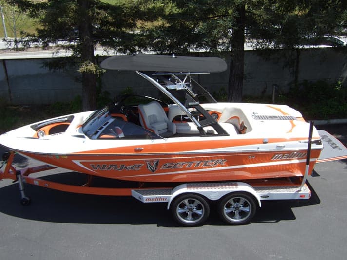 Extra large Malibu G3 complete bimini installed on a Wake Setter boat, providing shade and sun protection.