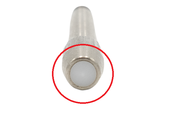 Close-up of a spinning rack pull-pin with a wear button, featuring a white button and a metal body, used for equipment safety.