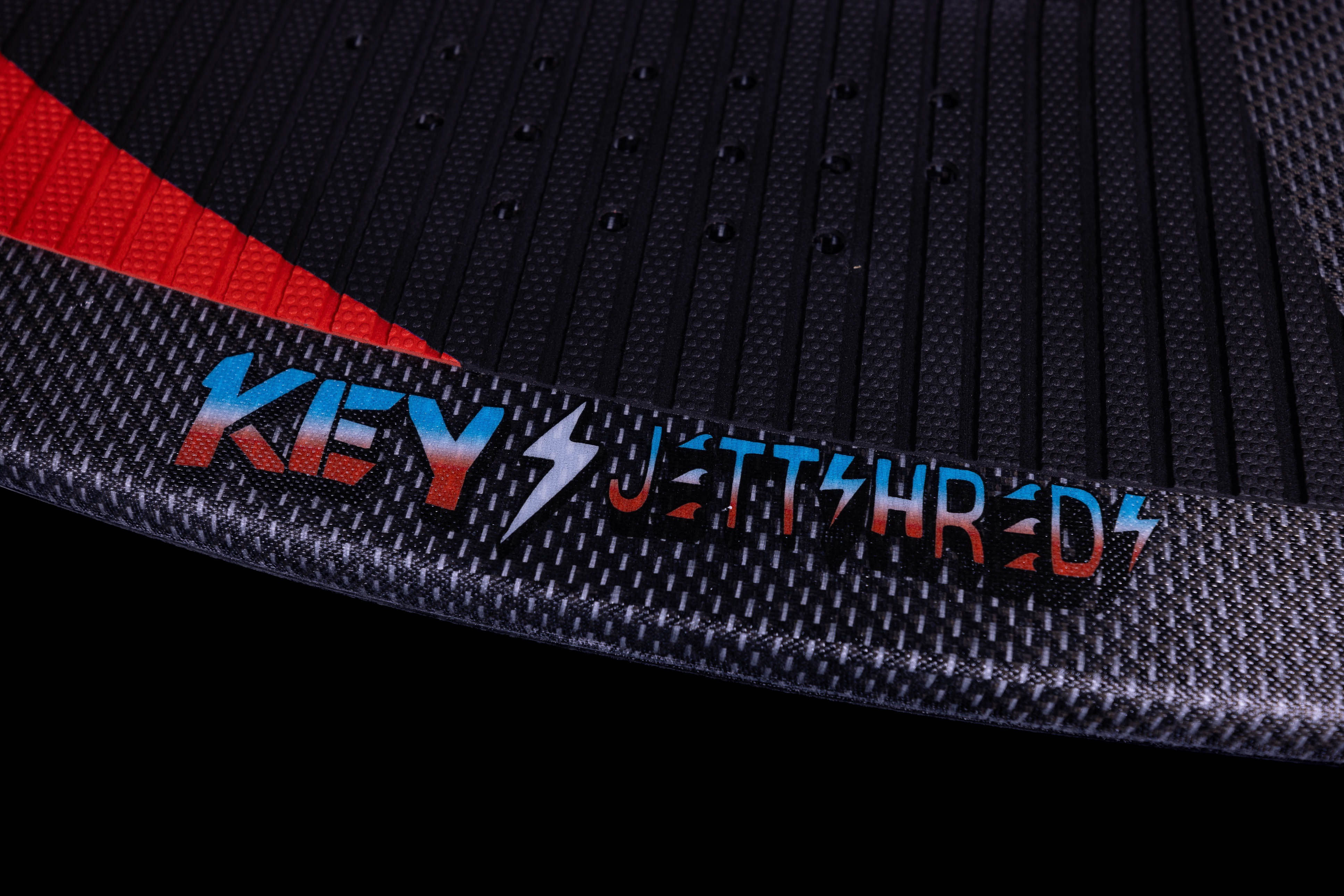 Close-up of the 2025 Phase 5 Key Jett Shreds skim board showing its textured surface and vibrant logo design.