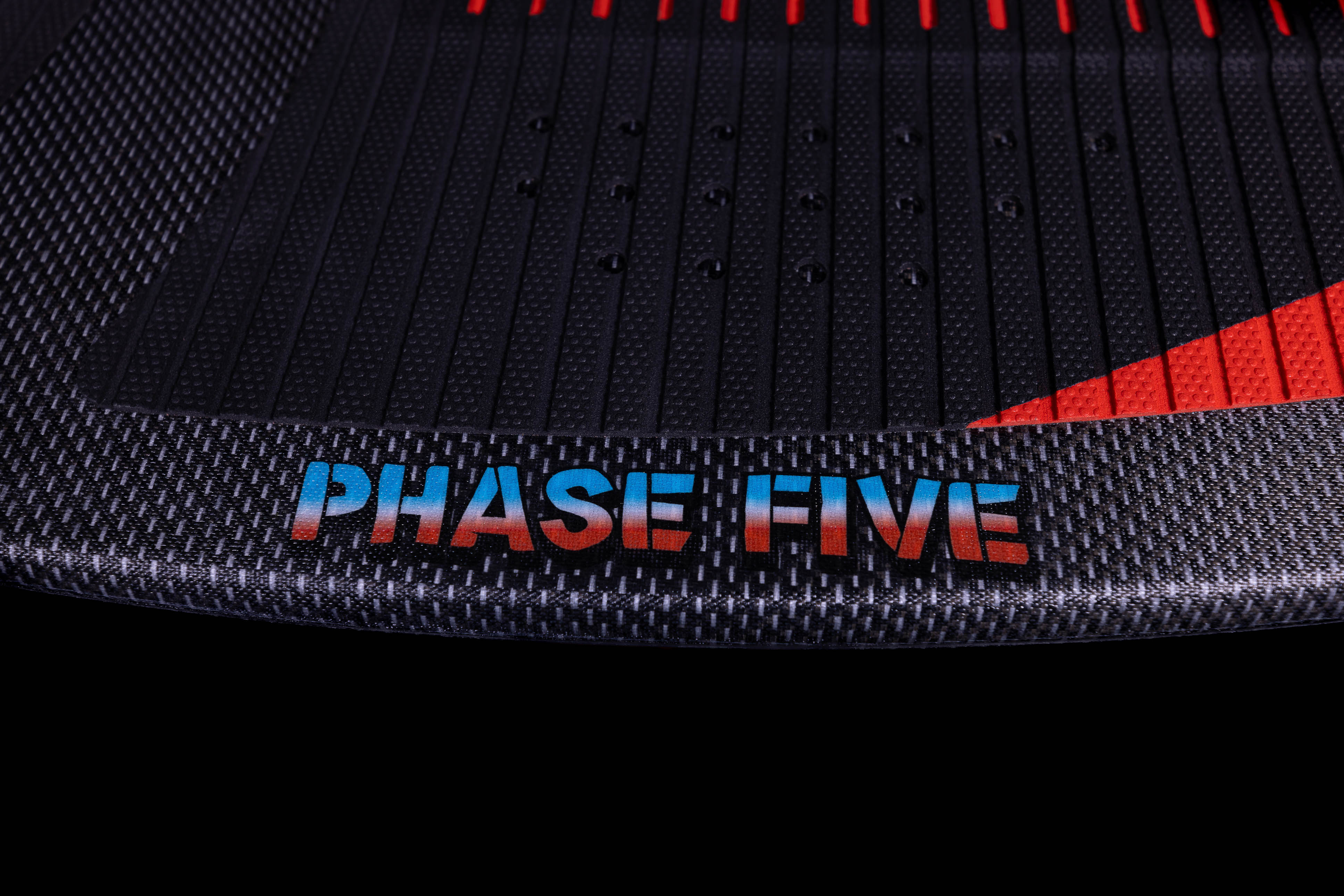 Close-up of the 2025 Phase 5 Key Jett Shreds skim board, showcasing its textured surface and vibrant branding.