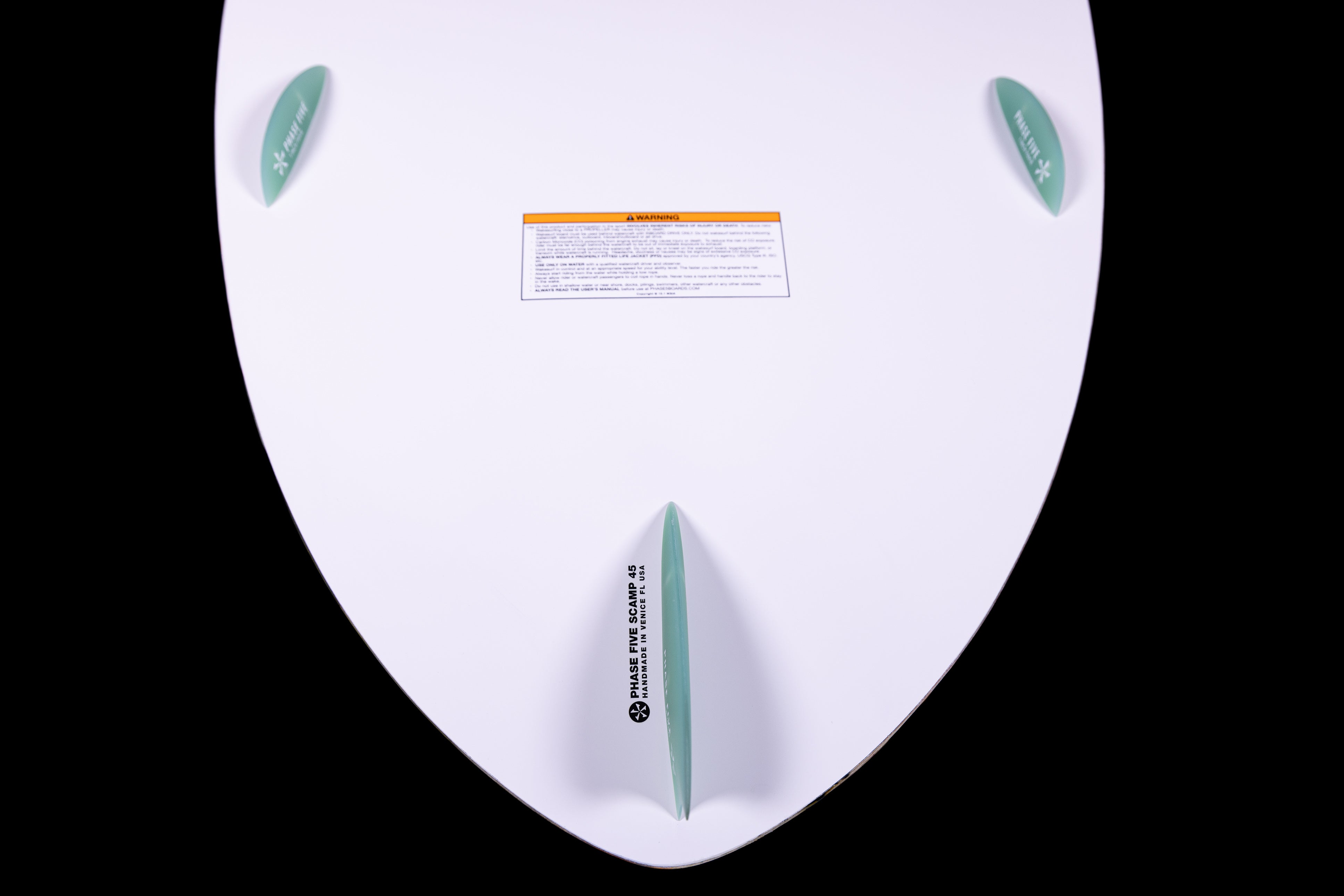 2025 Phase 5 Scamp Skim Board featuring a sleek design and fin setup for optimal performance on the water.