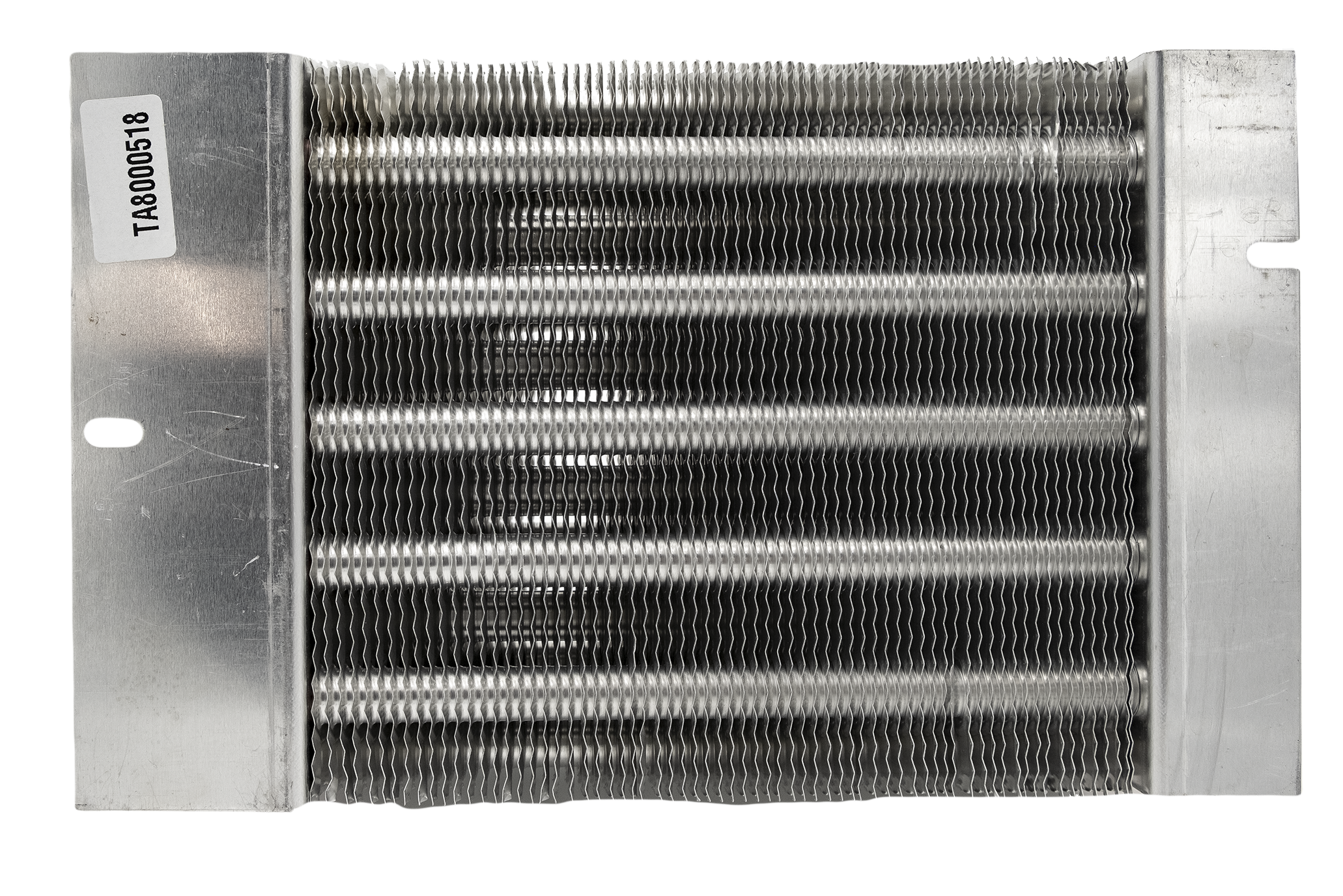 Alt text: "Close-up view of a Maradyne 2-outlet heater core featuring a dense arrangement of metallic fins and tubes with mounting flanges on each side, labeled with part number 'TAB000518'."