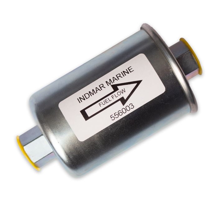 Indmar fuel filter with metal body, labeled with fuel flow arrow, part number 556003, used in marine engines.