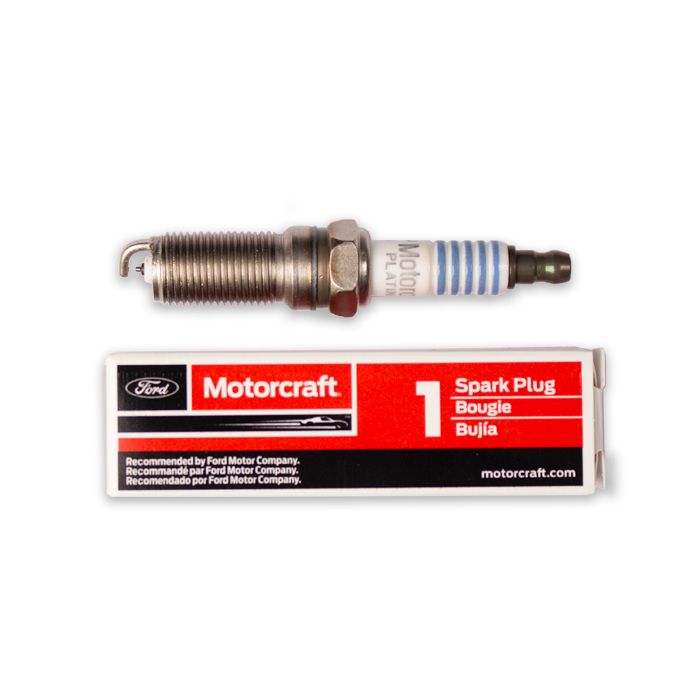 Spark plug for Ford 6.2 400/440 engines, shown with Motorcraft packaging, designed for optimal engine performance.