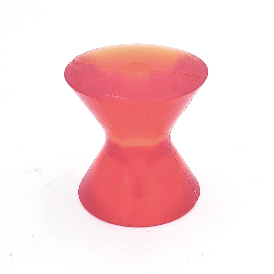 Orange roller-center with a smooth, conical shape, featuring a wider top and narrower base, used in skateboarding or roller skating.