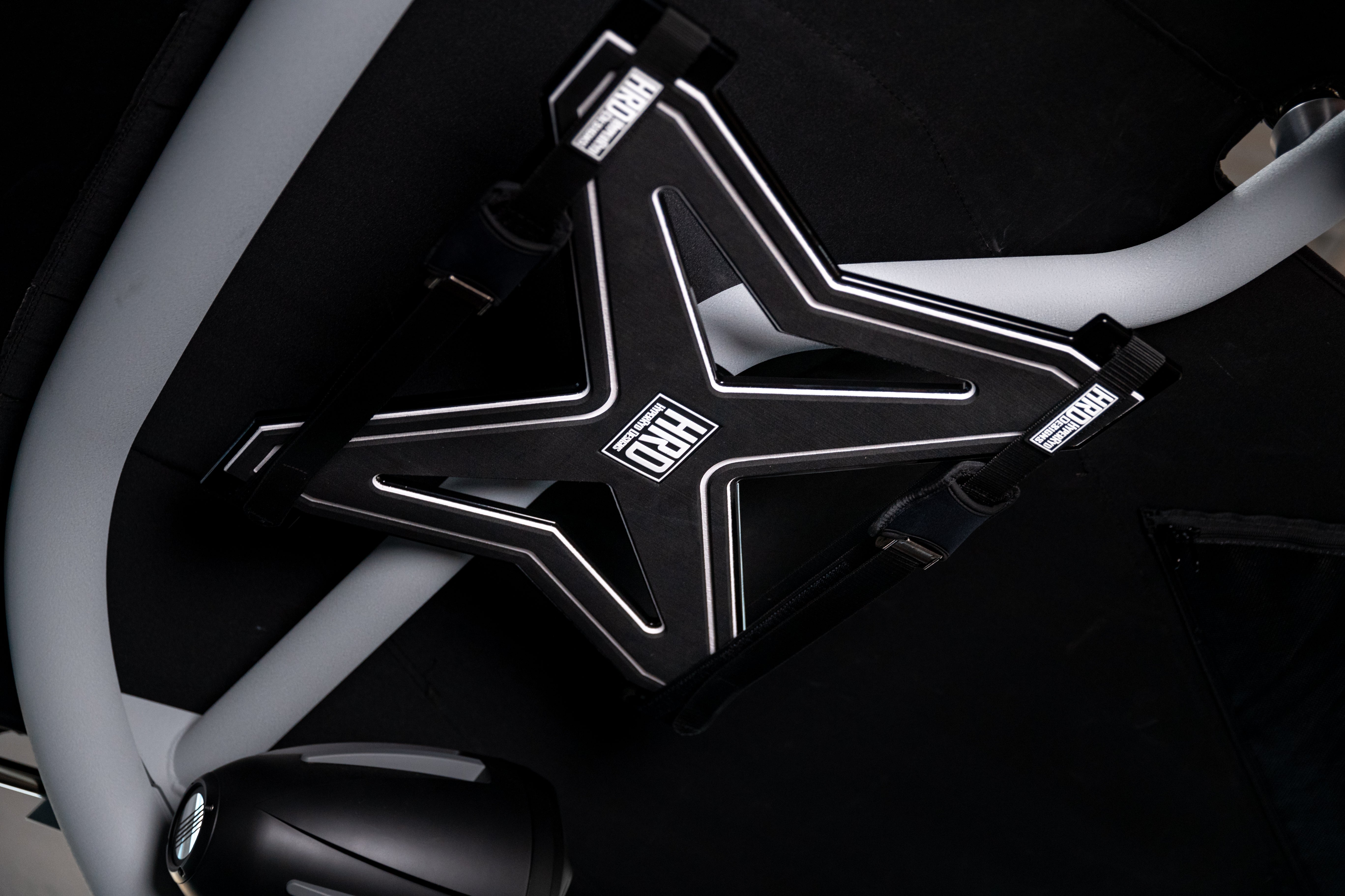 XR1 Surf Rack mounted on G3 & G5 towers, securely holding a surfboard on a vehicle roof rack system.