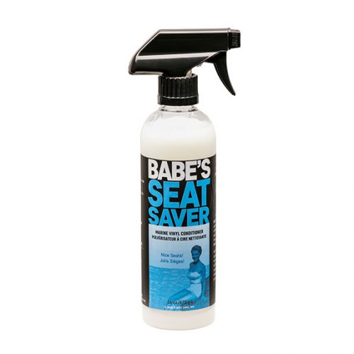 Bottle of Babe's Seat Saver marine vinyl conditioner with spray nozzle for protecting car seats from stains and damage.