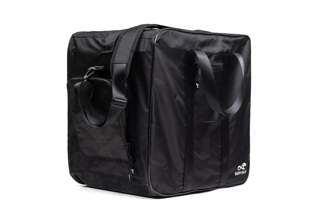Black heated towel bag with handles and shoulder strap, designed for carrying and warming towels on the go.