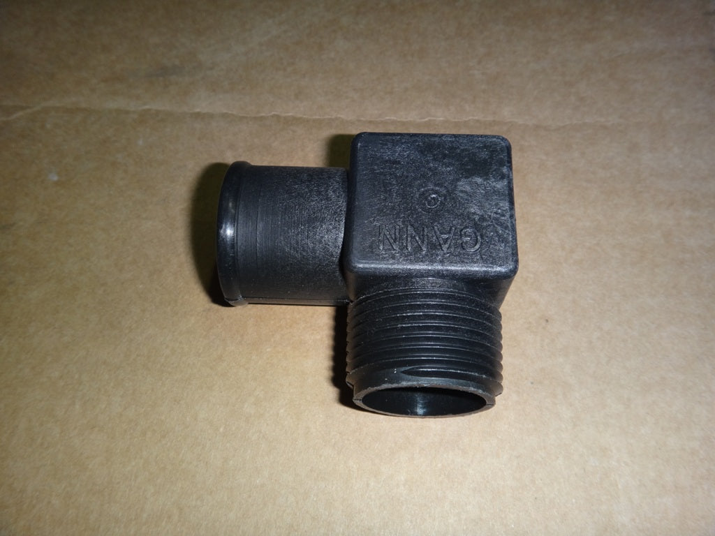Black nylon 1-1/4 inch elbow fitting with threaded and V-drive connections, suitable for plumbing or fluid transfer systems.