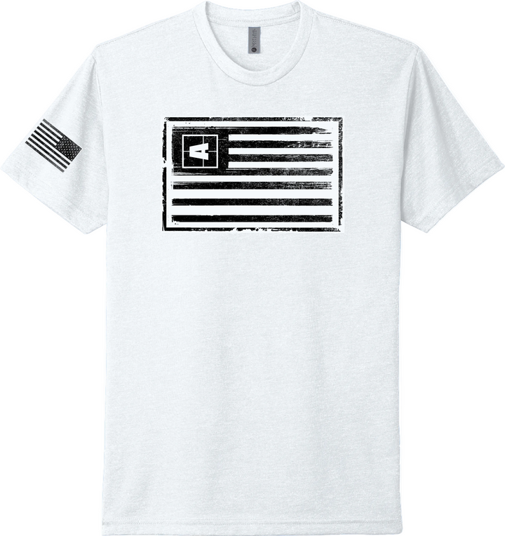 White Axis Freedom Tee with a black distressed American flag graphic on the front and a small flag on the sleeve.
