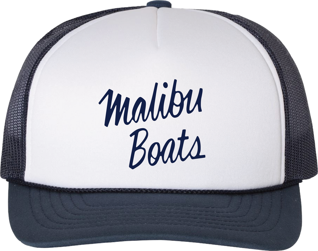 Trucker hat with "Malibu Boats" embroidered in navy blue on a white front panel, black mesh sides, and a curved black brim.