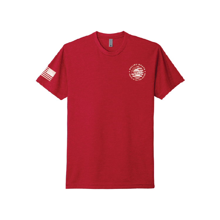 Red Patriot Tee featuring a flag design on the sleeve and a logo on the chest, perfect for casual wear and patriotic events.
