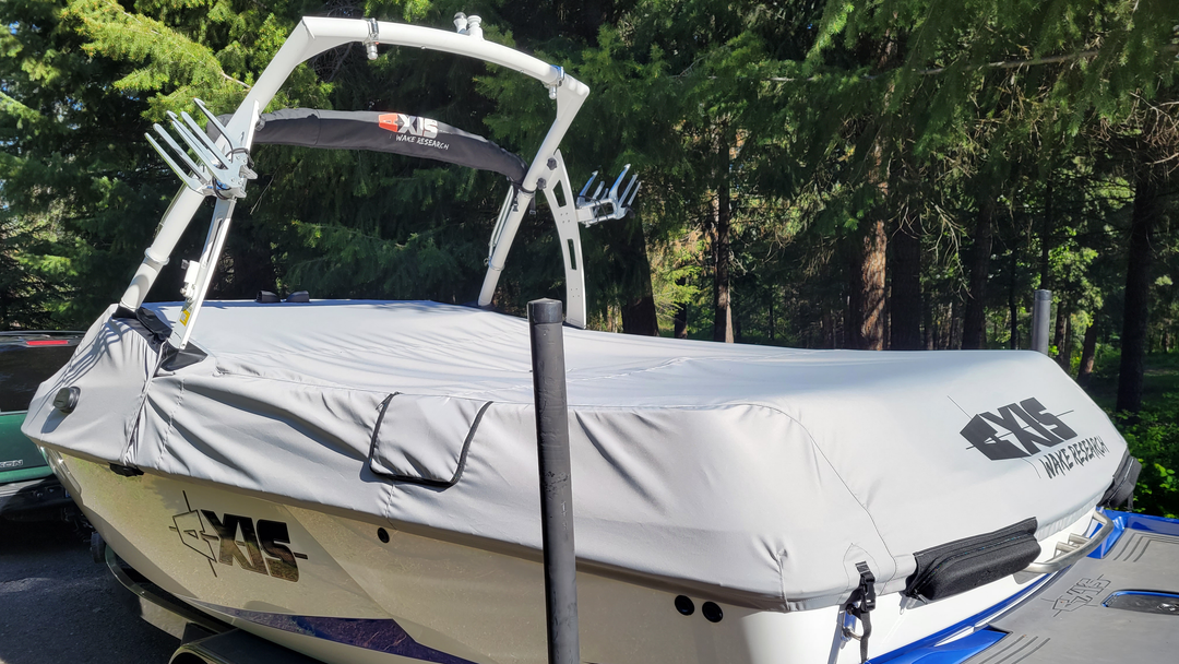 Cover for the FatAX Tower on a boat, featuring the AXIS Wake Research logo, protecting the tower from the elements.
