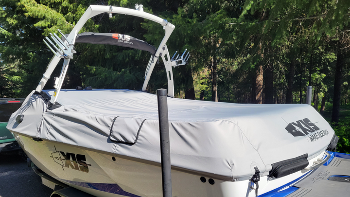 Cover for the FatAX Tower on a boat, featuring the AXIS Wake Research logo, protecting the tower from the elements.