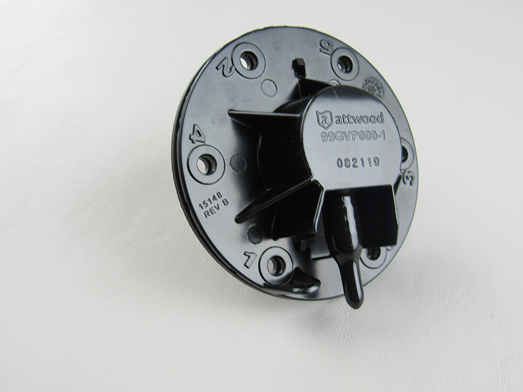Malibu fuel valve with attached gasket, black plastic handle, and metal mounting plate, used for boat fuel systems.