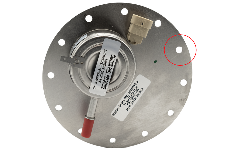 In-tank fuel pump washer with metal mounting plate, electrical connector, and warning label for marine boat fuel system.