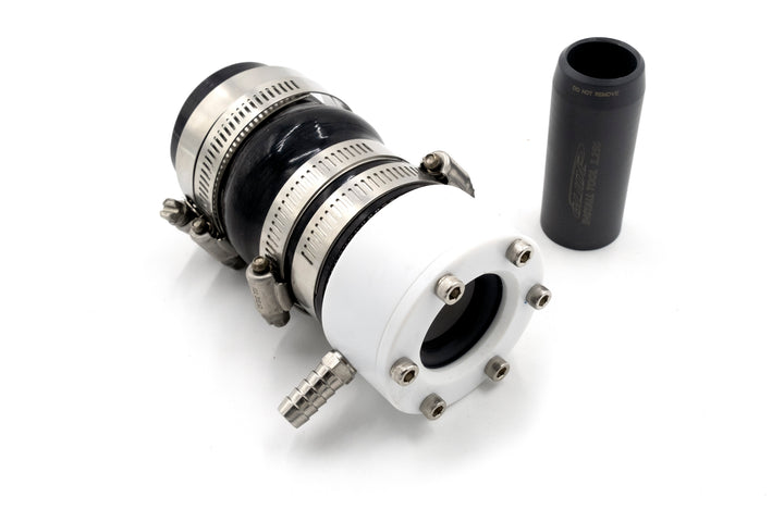 Close-up of a shaft seal assembly with a 1-1/4" diameter, featuring metal clamps, a white flange, and a black rubber seal.