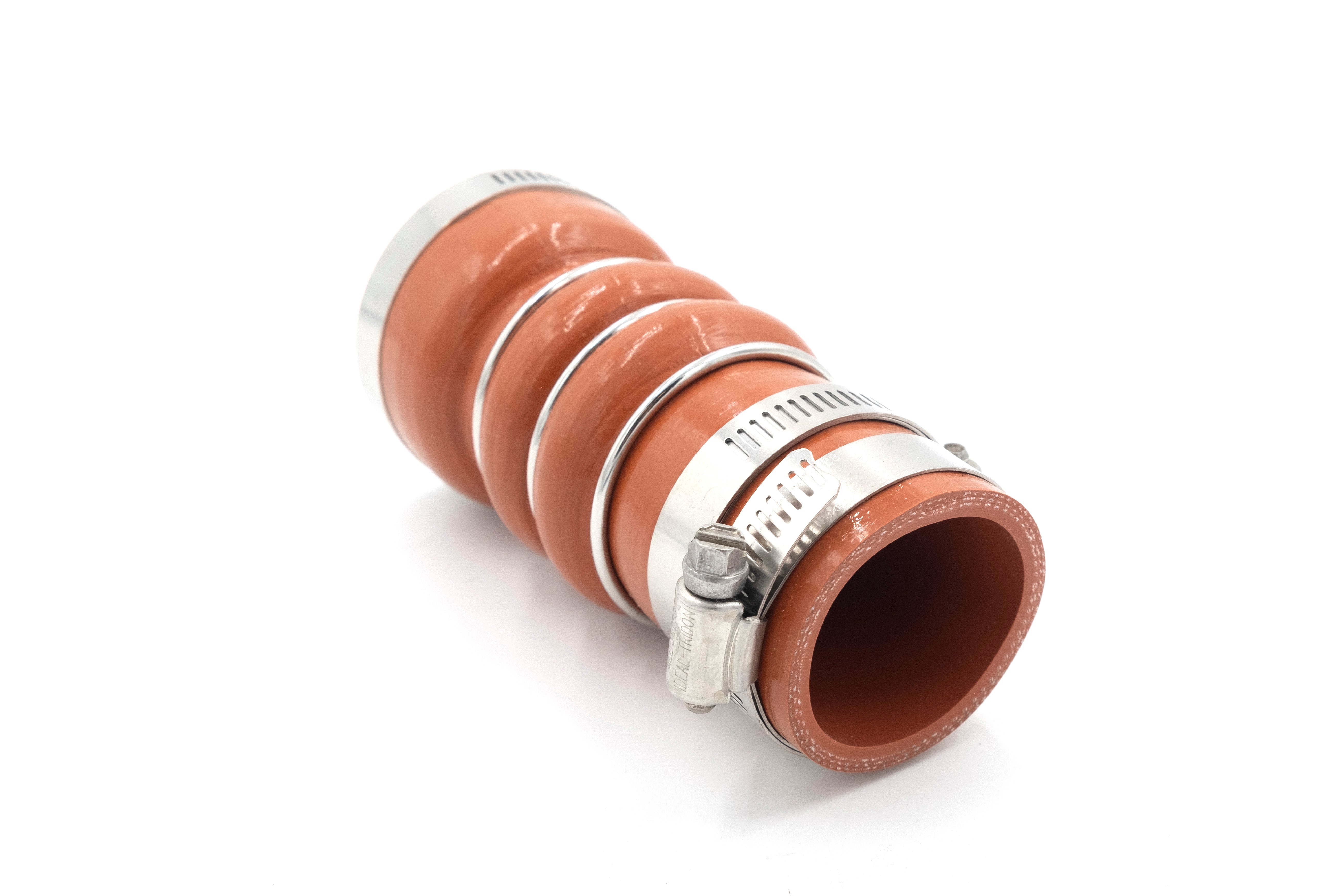 Rubber shaft seal with metal clamps, used to prevent leaks in rotating machinery, isolated on white background.