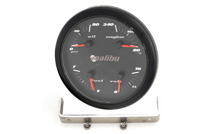 Malibu 4-in-1 gauge with oil, engine temperature, fuel, and voltmeter readings, mounted on a metal stand against a white background.