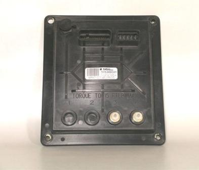 Black Medallion MMDC control module with multiple connectors and labeled torque specifications, mounted on a white background.