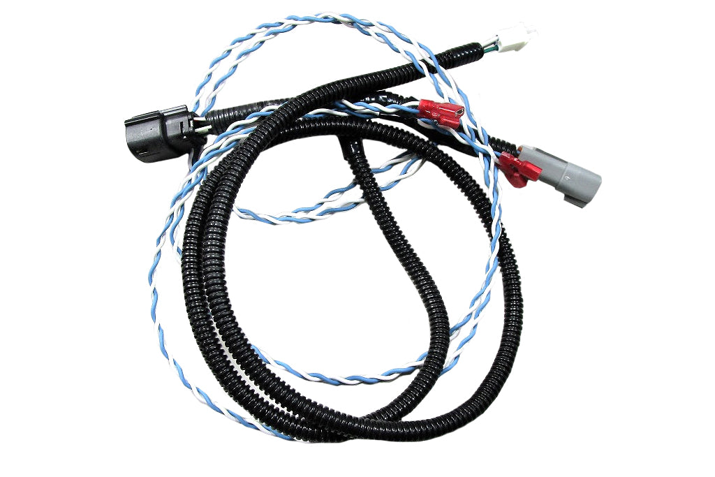 Harness Medallion GPS Speed Nav wiring harness with black, blue, and white cables and connectors for vehicle navigation systems.