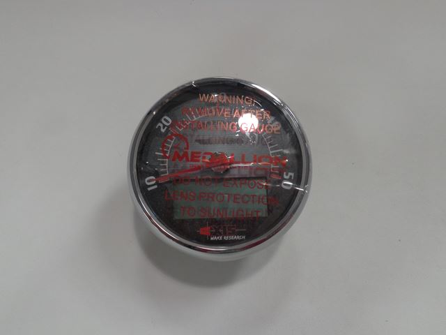 Speedometer 5" Axis, 13 with warning labels, black face, red needle, and protective glass cover.