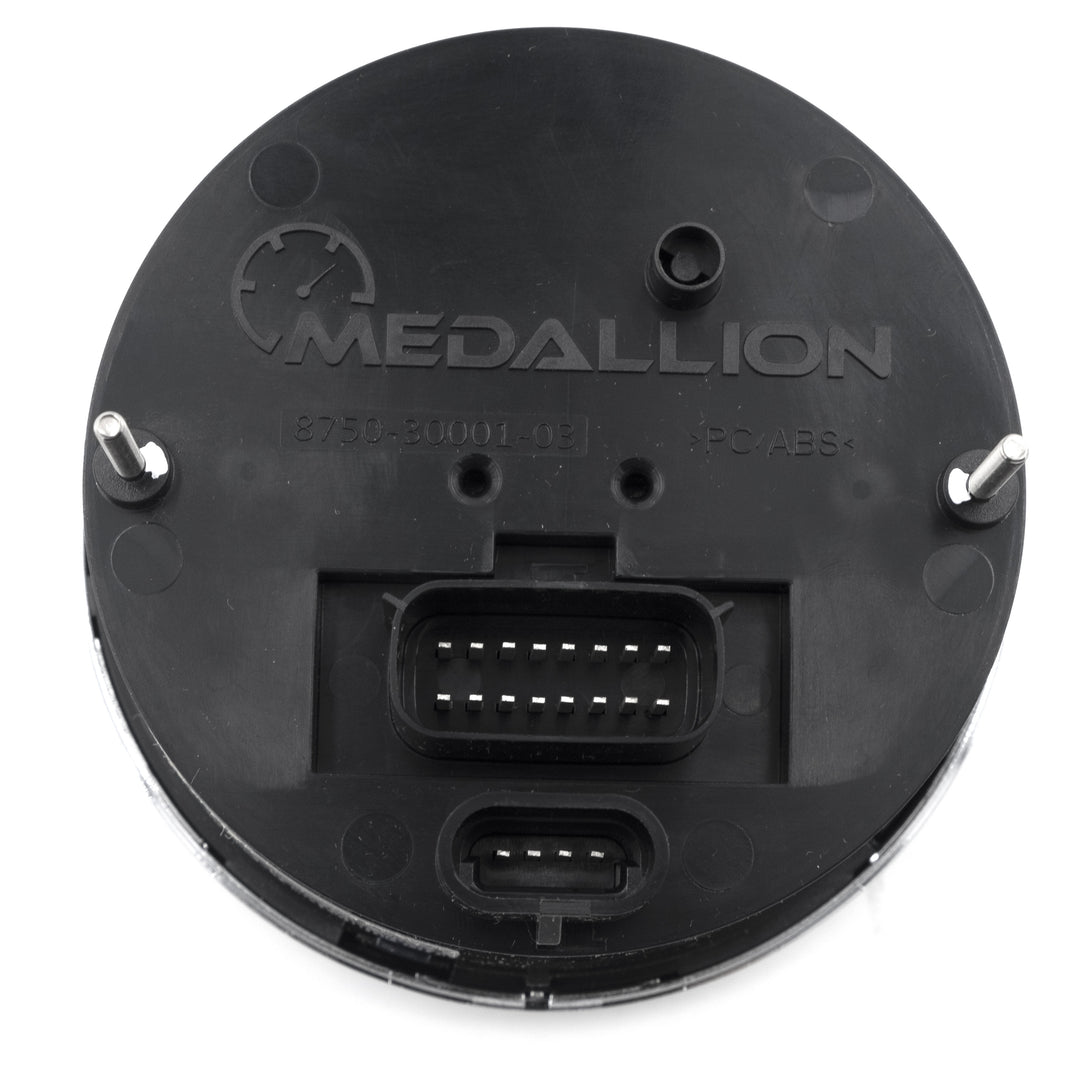 Back view of an Axis Tachometer with connector ports, mounting pegs, and Medallion branding on black plastic.