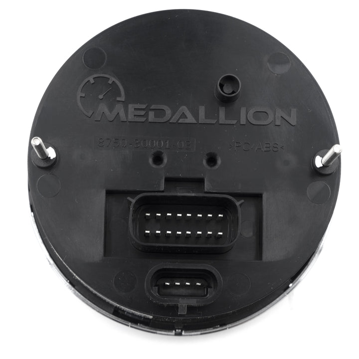 Back view of an Axis Tachometer with connector ports, mounting pegs, and Medallion branding on black plastic.