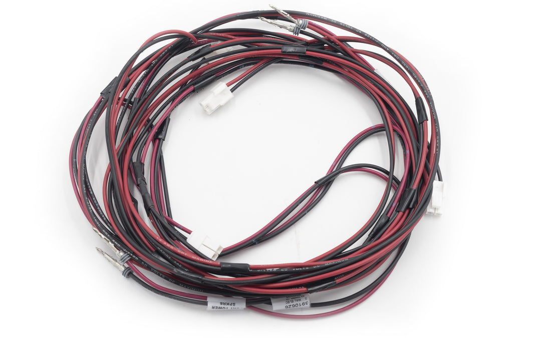 Coiled tower speaker harness with black and red wires, white connectors, and labels for audio system connections.