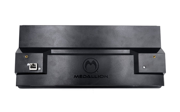 Alt text: Front view of a 12-inch Medallion touch screen display, featuring a sleek black casing with visible connectors and the Medallion logo centered on the front panel.