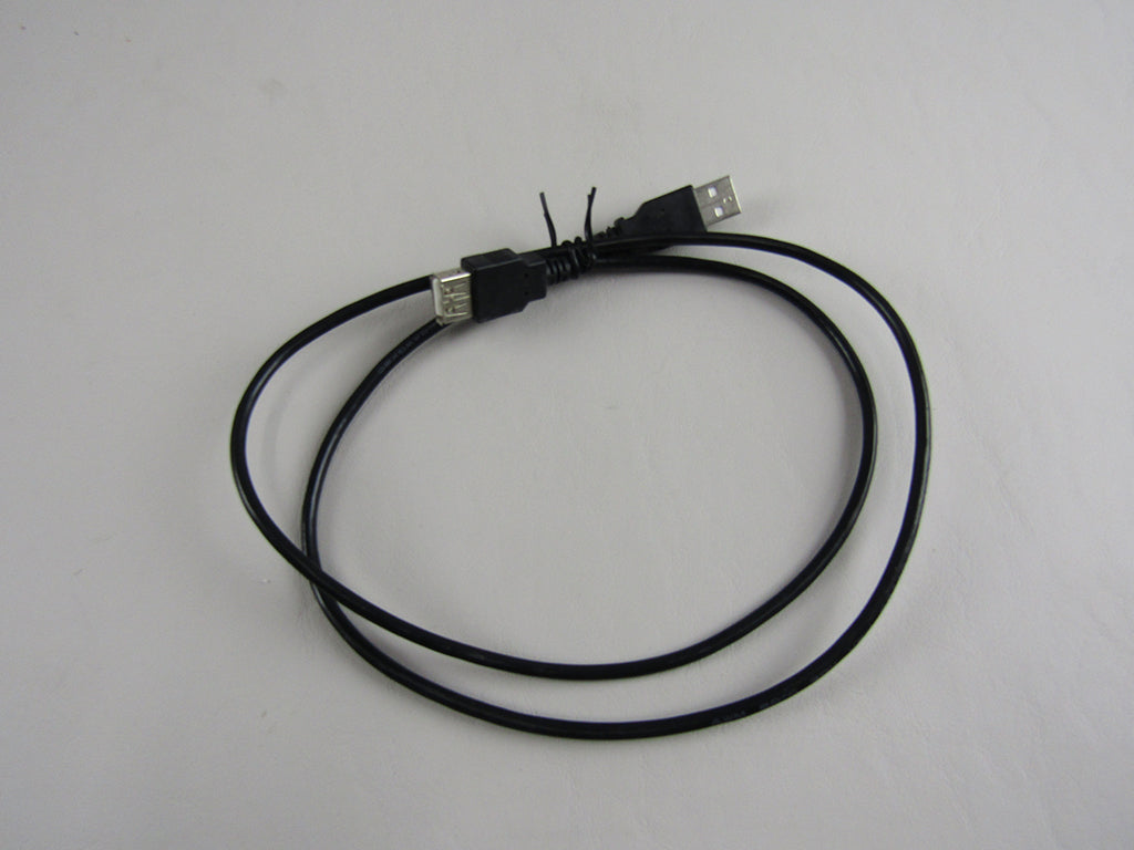 Alt text: "Black 1 meter USB cable coiled and tied with a twist tie, featuring a standard USB-A connector on one end and a micro-USB connector on the other, on a plain white background."