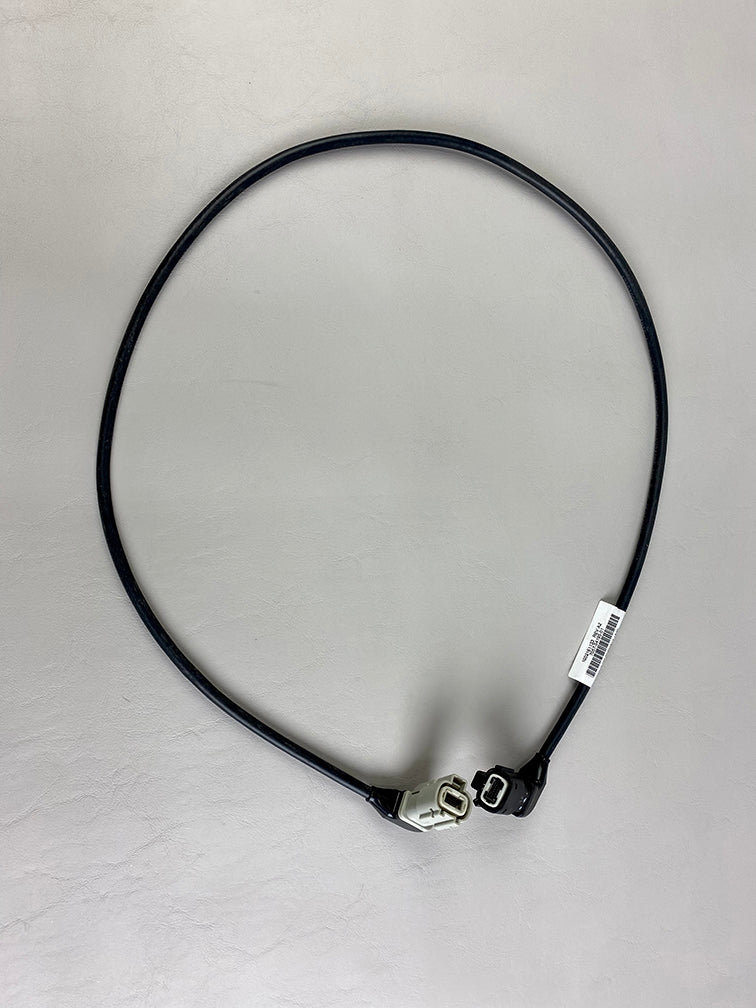 Malibu display cable harness with black cable and white and black connectors, used for connecting display components.