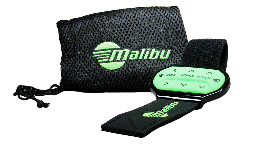 Malibu surfboard leash with a glow-in-the-dark control device and black mesh carrying pouch, used since 2016.