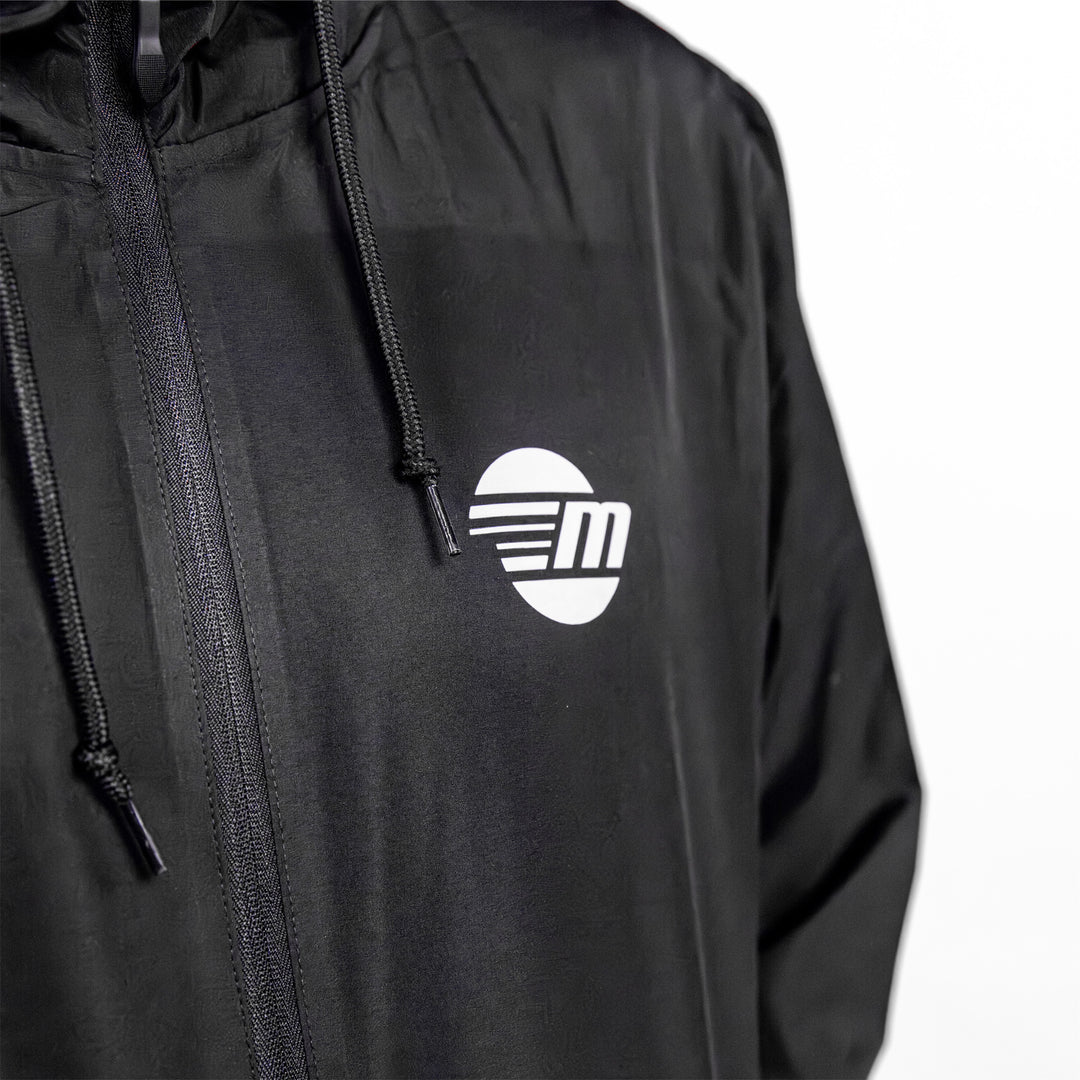 Black Offshore Jacket featuring a logo on the chest, designed for boating and outdoor activities.