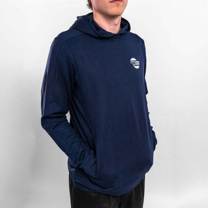 Navy Malibu Performance Hoodie featuring a logo, designed for comfort and style during boating activities.