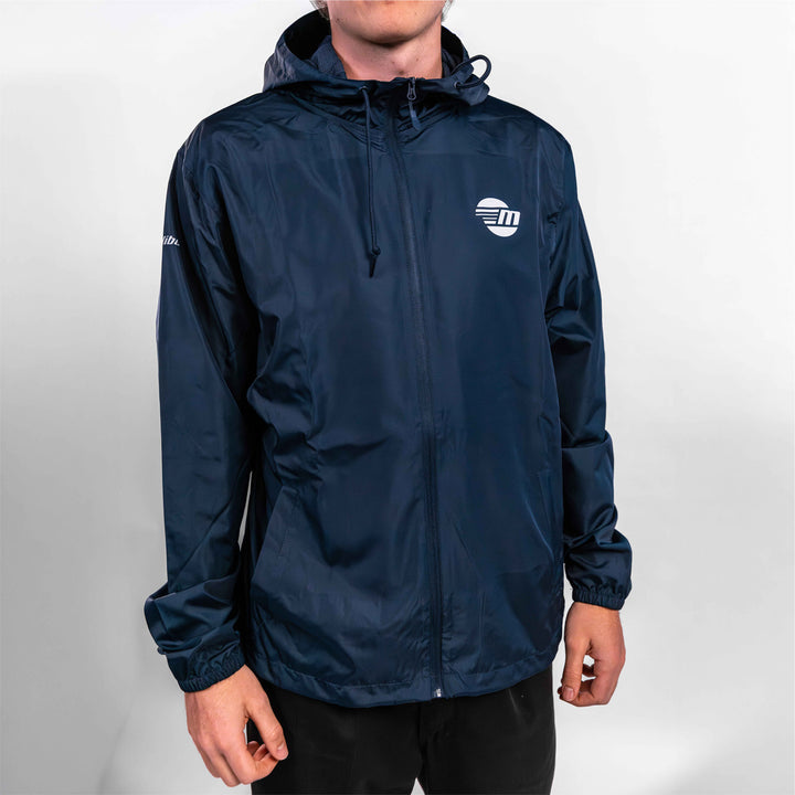 Navy Offshore Jacket featuring a front zipper, adjustable hood, and logo, ideal for boating and outdoor activities.